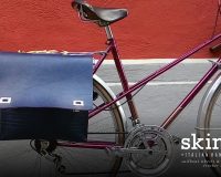 Two versions of a bike bag Skinclò in genuine leather